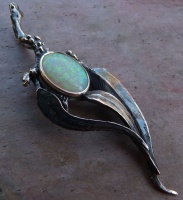 Pendant with 3 gum leaf design opal bezel set, blackened Sterling Silver